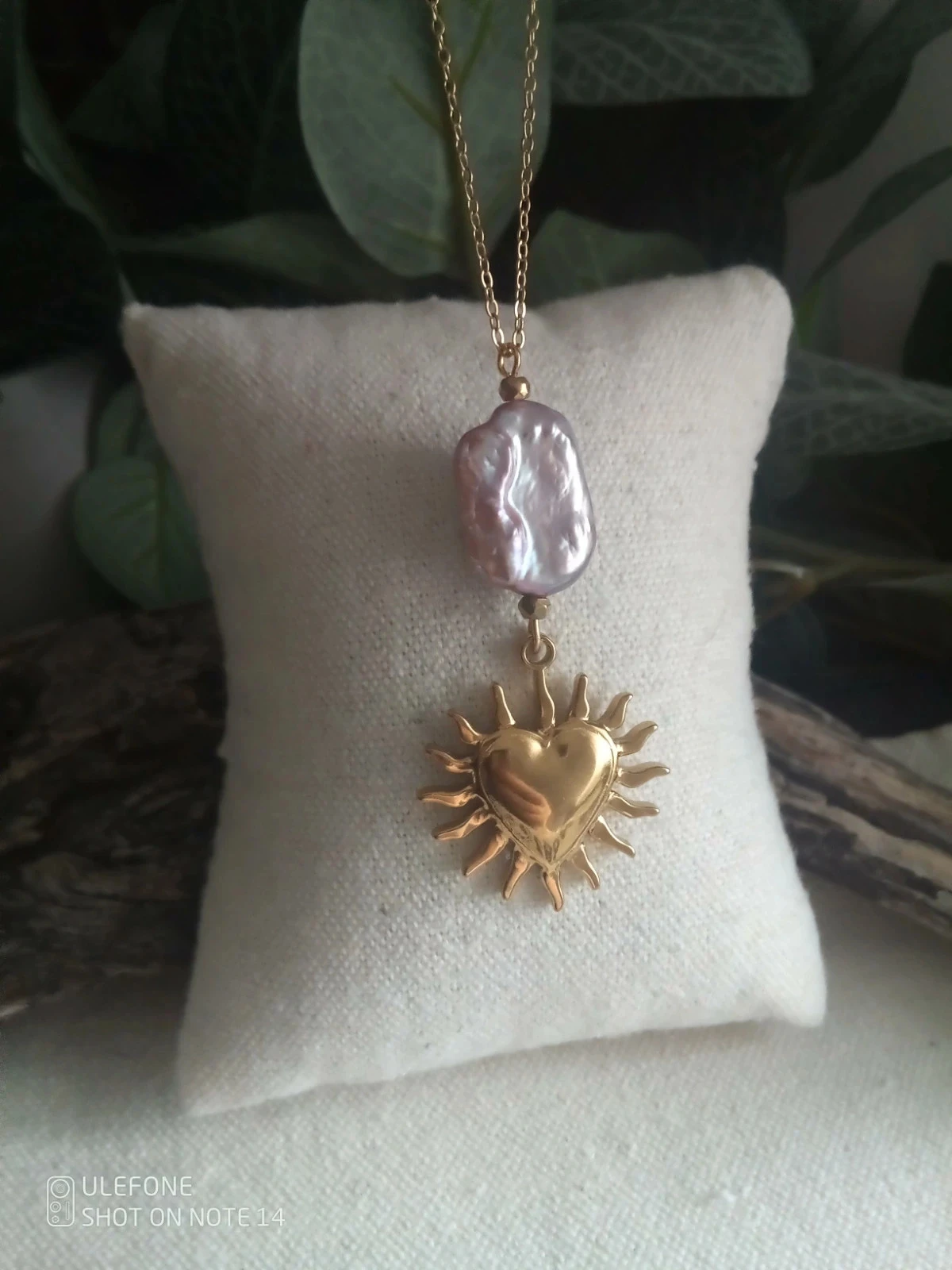 Collier perle de culture d'eau douce et coeur soleil